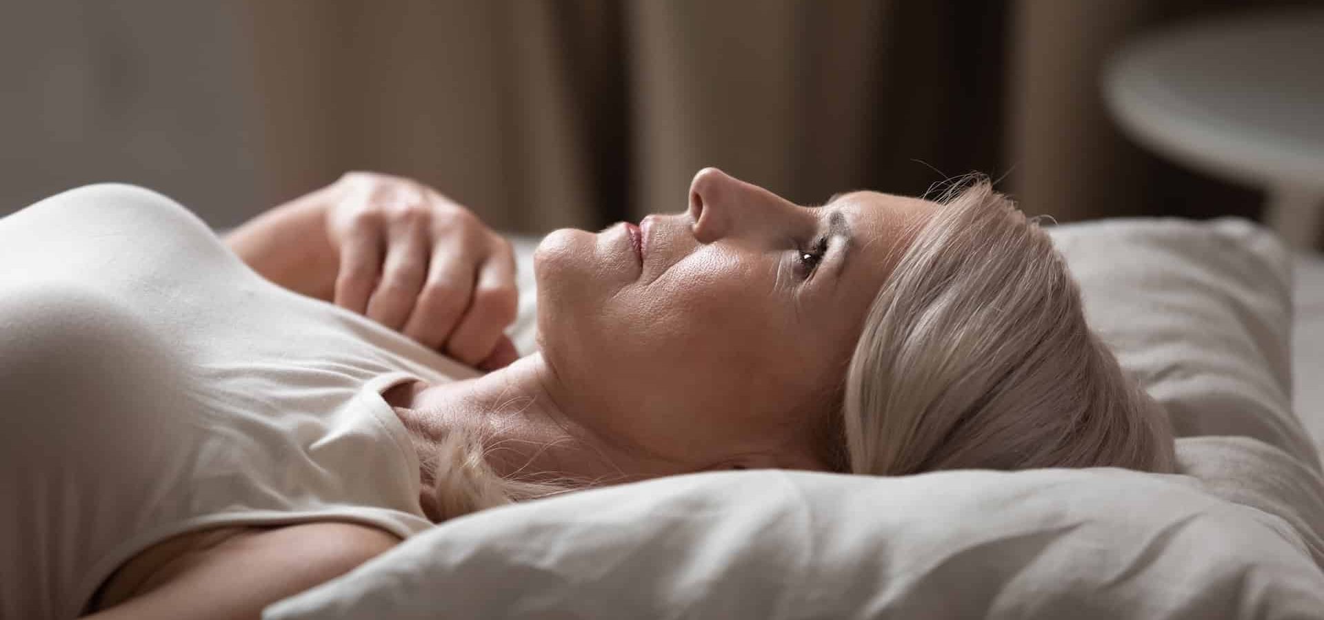 Disturbed mature older woman lying awake in uncomfortable bed look up suffer from chronic insomnia concept, anxious middle aged senior lady insomniac can not sleep on bad pillow mattress, side view SSUCv3H4sIAAAAAAAACnRTzW7UMBB+leIb0gbZWedvzxx4AU6bqho7zq5pEkexw49WK3EHwbUCqRJ9gkoFCakUXsH7RoyTItRSDokm88188/dlRwRYLclqR3TTjNYN4LTpyIouyKC6Sg2TqSrtzKChmb4EOLntoFVk1Y1Ns18Q68CNVtnAY7ejc2qwzshTsloiKsGpDabP+G3B9S74yYoQTB9FMPaLB3zHCwIb1ck3IRcaaNFYk6VM0zwHEdWZlBGXNY3yNFVRwRgiKqaipkhSqJjFHLIoLhiG5TSOCslExKmsRZHmHIqKYAWhN1O//dY4E/gx95mCxm0DWqneWO0m0N6icTIhg4LWOh1WsSaMpYiwmIXKccDv7mJKzMjxHncyqEbBtLE1oUJBlXMRAa3yiCMNzsEBx2JCoAtEPVU7fYVcbVgiEsBYaWx1R14aCY2dN90PWupuM0cYtw3nw52asXMD7i3Ub4zpQTTYcI1pakG2YC0GVLeOcC/UgWlnks640GTIrPCMaLFlzFLKl8WyKLI0TZMw7iyArcbEUGhHxr4xUKnqX0WwJGNJWvAkCcIZRasR/H9ckbCwr8mpqwcURp6zrOA0S5dJjBIiGrkI5AKYoDSSRZJFHBuNBOd1pBKWoTgUhzToY+4ynHx355YM91sZof60ssCrLod6su5pBT339IEeCd29mN50VTJjpjHjIMzrucysaLRaY/9S4By1GdrpZxjA4rTT6fDSPaAoV+TpqiwfHfkv/sKf+0/+rCz9+eGt/+6v8Lnxl/768K4sY8qK+X1CsxN/dviA/vdlyejjI/8Zv776Hxh/7S+PkOib/4XmT6S6QIKbw8ey5PTJi35D9r8BAAD//wMAJe6s9SgEAAA=
